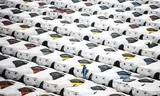 Auto’s voor de export in de Japanse haven van Yokohama, op 11 april. 